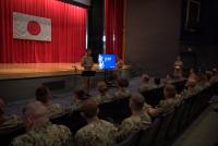 Captain Coats presents the U.S. 7th Fleet's MU1 Maliza Sailor Of The Year Award