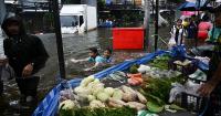 Flooded Bangkok street turns into a floating market