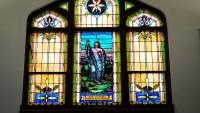 Woman Turns Old Church Pews Into the Library Wall of Our Dreams