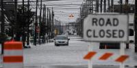 Nor'easter to bring final day of rain to millions as communities assess flood and beach damage