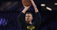 Warriors center Kristaps Porzingis dealing with health issue, won't travel to Hawaii training camp