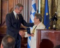 Greek Prime Minister Kyriakos Mitsotakis Honored Educator Athena Tsokou Kromidas