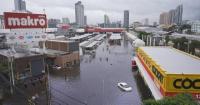 Eight dead as floods swamp Thailand