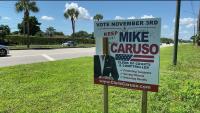Suspended Palm Beach County Clerk of Courts Mike Caruso's campaign sign damaged after arrest