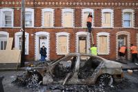 Minister to explore cash for Northern Ireland communities hit by race riots