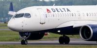 Tourists rushed to hospital after smoke pours into cabin of packed passenger jet