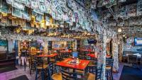 Staff at Florida bar pulls $14,000 off walls to donate to Hurricane Dorian relief