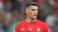Why is Granit Xhaka not playing for Switzerland against Scotland?