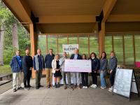 SLICFiber presents $16K donation to Saratoga Springs non-profit Kelly’s Angels