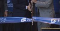 Global company opens East Coast hub in Uptown with promise of hundreds of new jobs