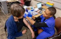Local ER visits for COVID and flu are ticking up. Here’s how health experts recommend protecting yourself this fall