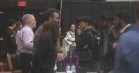 ‘I don’t think it’s going anywhere’: Job seekers pack BU for Boston AI Week