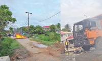Road blocked, truck torched as Police attempt to search Vigilance house for missing Surinamese men
