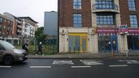 Eight years ago, government made it easier to turn old shops and offices into homes. How's it panning out?