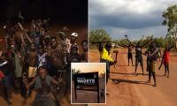 Inside the 'Wild West' Australian town where a young man was speared through the back, cars are torched and gangs roam with bows, machetes and metal bars