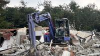 Indonesian authorities demolish luxury prison 'villas' where whisky, TVs seized