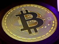 Bitcoin rides risk roller coaster as speculative bets wind down