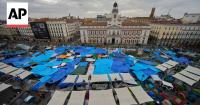 Spain housing protesters pack Madrid square demanding protection for tenants