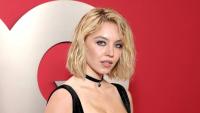 Sydney Sweeney’s Vacation Pics Prove That a Classic Red One-Piece Will Always Be in Style