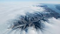 Nearly 2,000 Valleys Beneath Greenland's Ice Sheet Link Up in a New Map, a Third Newly Found