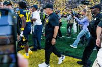 Michigan heads to Minnesota after a tough loss, with a coach who refuses to sugarcoat anything
