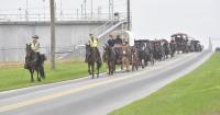 Amish wagon train begins, highlighting roots of Stoltzfus families in colonial Pennsylvania