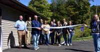 Concern cuts ribbon on new central office