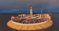 Chinese border ports hold National Day flag-raising ceremonies