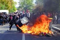 French school protests spread as fires, blockades deepen unrest