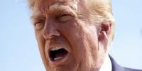 ‘They’ll be hit very hard’: Trump sends roughly 9,000 troops and a third aircraft carrier to the Middle East after warning strikes on Iran