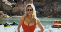 Sydney Sweeney dons iconic red swimsuit on romantic trip after Taylor Swift snub