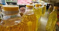 Taipei prosecutors indict two people for camellia oil fraud