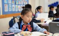Updated First Grade Curriculum Reduces Students' Backpack Load