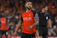 Luton striker plays down injury fears while on international duty