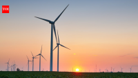An Oregon farming couple had 13 wind turbines placed on their land; while crops continued around them
