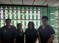 Students from Stonecrest help families grow food