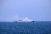 UK says ship struck by projectile in Hormuz