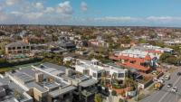 Australian home prices slide for sixth consecutive month