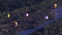 Balloons take flight with several minor crashes on day 1 of Balloon Fiesta