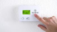 New York utility says 65-degree setting could trim heating use 15%, warns about space heaters