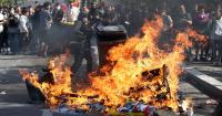 Paris riots: French capital in flames as hundreds of furious protesters arrested