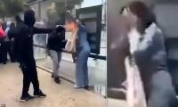 Boy, 15, arrested for burning woman's face with makeshift flame-thrower as student riots continue to rock France