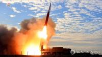 N. Korea's Kim oversees intermediate-range missile launch, calls for bolstering war deterrent
