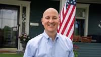 U.S. Sen. Pete Ricketts participates in Harvest of Harmony Parade