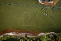Cry for help as French-Swiss lake dries up
