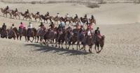 Tourists enjoy desert fun in Kashgar during National Day holiday