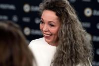 Olivia Colman walks Miu Miu runway at Paris Fashion Week