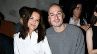 Katie Holmes and Jason Bard Yarmosky look cozy together while front row at Paris Fashion Week