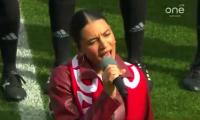 Canadian national anthem descends into chaos as singer forgets the words and starts giggling... before crowd boo her: 'Should get her passport stripped'