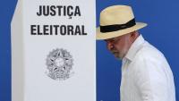 Brazil election headed to runoff, projection shows, as Bolsonaro lead narrows